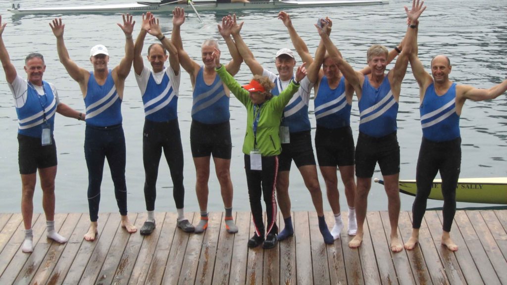 Quintin BC men’s eight Masters E celebrating on the pontoon after winning gold at the World Rowing Masters Regatta